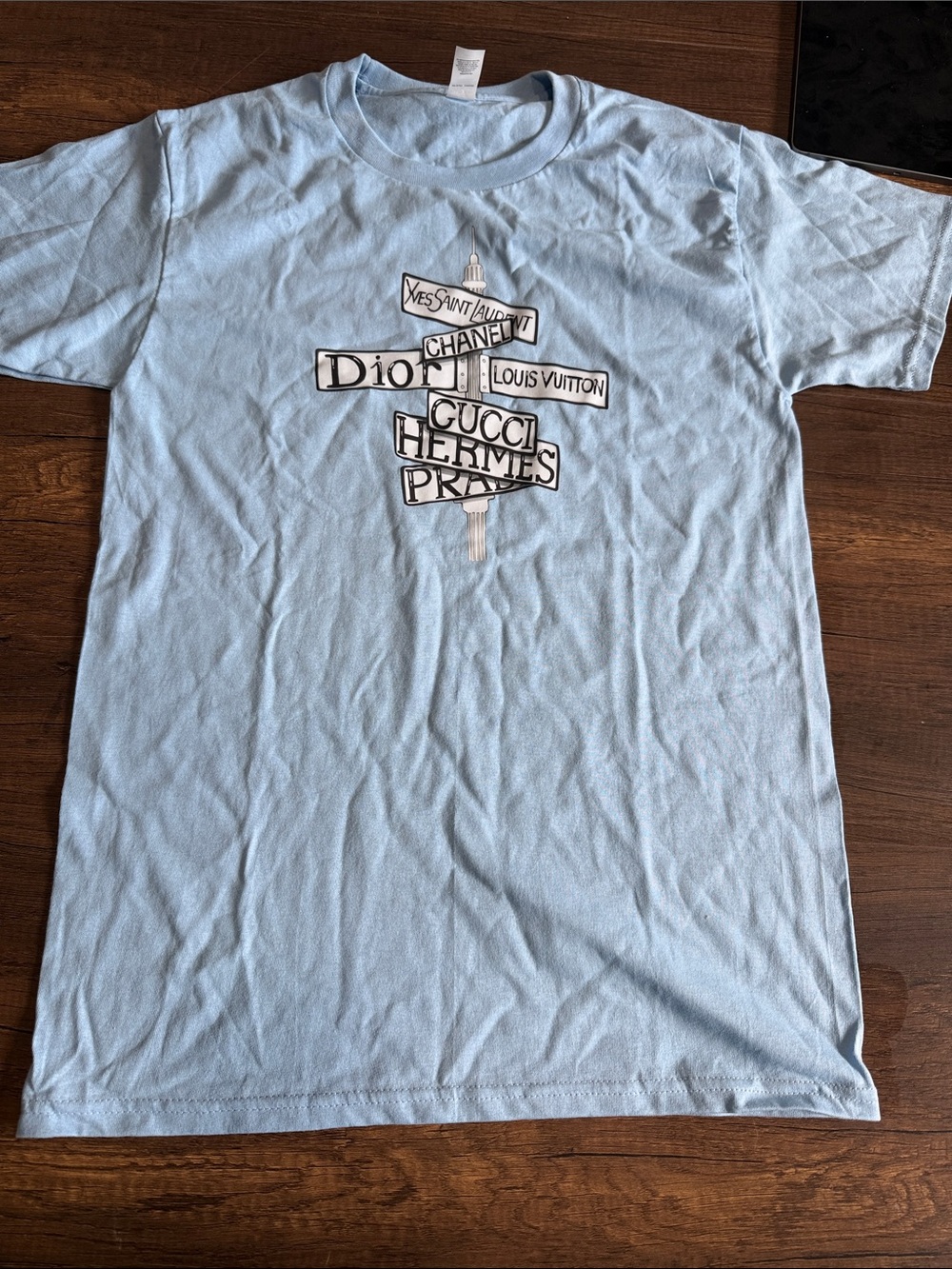 Light Blue Graphic Women’s Tee with Designer Signpost Print